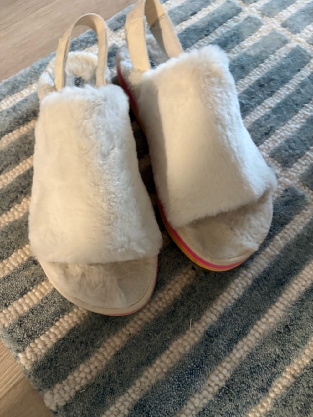 Tom’s faux fur slip ins with rainbow 🌈 stacked heel